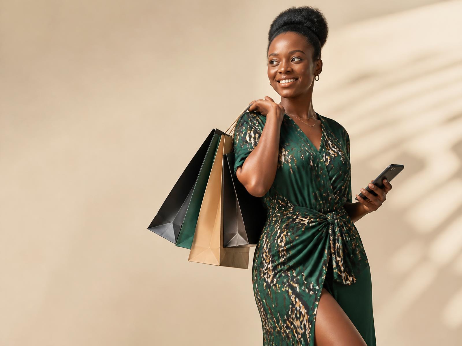 Shopper in Kampala carrying NLSC delivery bags